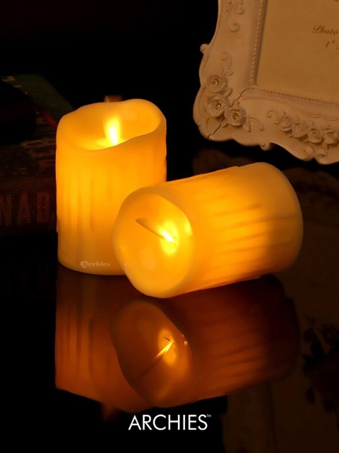 

Archies Yellow Textured Glass Decorative Candle Lights