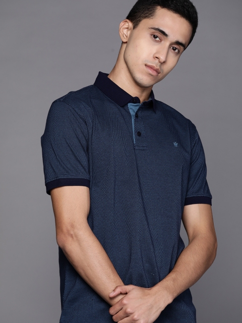 

Louis Philippe Men Navy Blue Self Designed Pure Cotton Polo Collar Pure Cotton T-shirt
