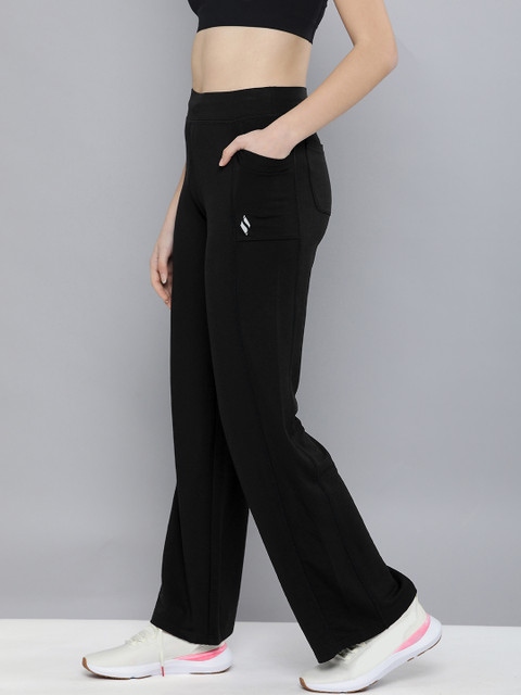 

Skechers Women Black Solid Flared Track Pants
