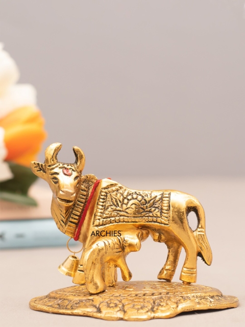 

Archies Gold-Toned Feng Shui Kamdhenu Cow Showpiece