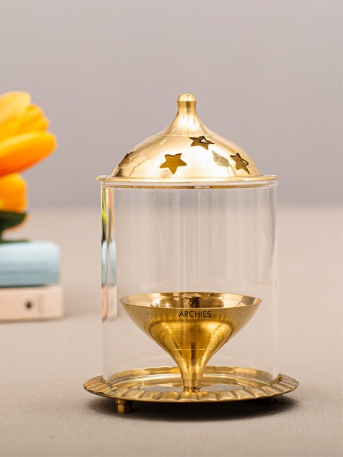 

Archies Gold-Toned Glass Akhand Diya Oil Lamp
