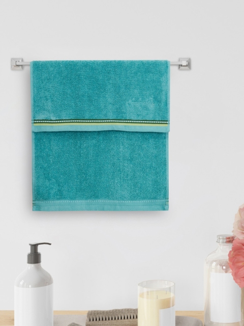 

Home Centre Blue Solid 500 GSM Hand Towel