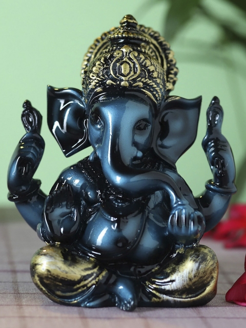 

Ferns N Petals Gold-Toned & Blue Ganpati Idol Showpiece