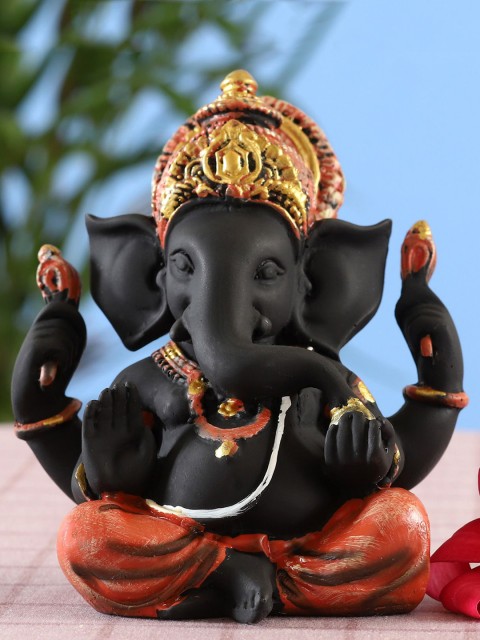 

Ferns N Petals Black & Orange Ganesha Idol Showpiece