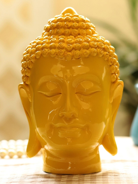 

Ferns N Petals Yellow Buddha Idol