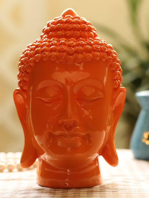 

Ferns N Petals Orange Buddha Idol