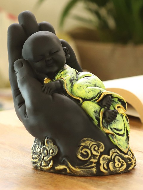 

Ferns N Petals Black & Green Sleeping Monk On Hand Idol