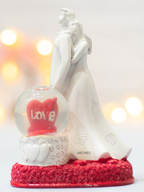 

Archies White Premium Romantic Lovers Statue Showpiece