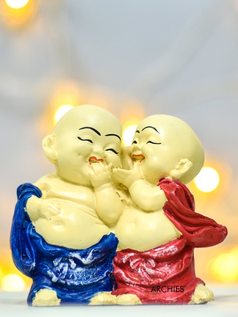 

Archies Set of 2 Red & Blue Buddha Monk Idols Statue