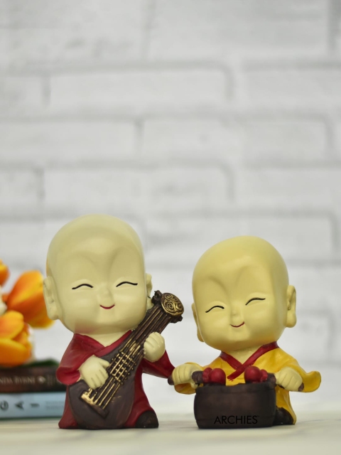 

Archies Beige Set of 2 Buddha Monk Idols Statue