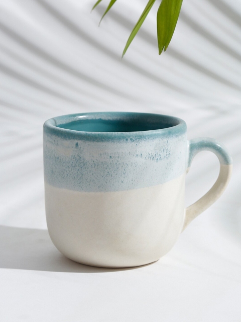 

Fabindia Teal & Off White Off White Off White Solid Ceramic Glazed Matte Mug