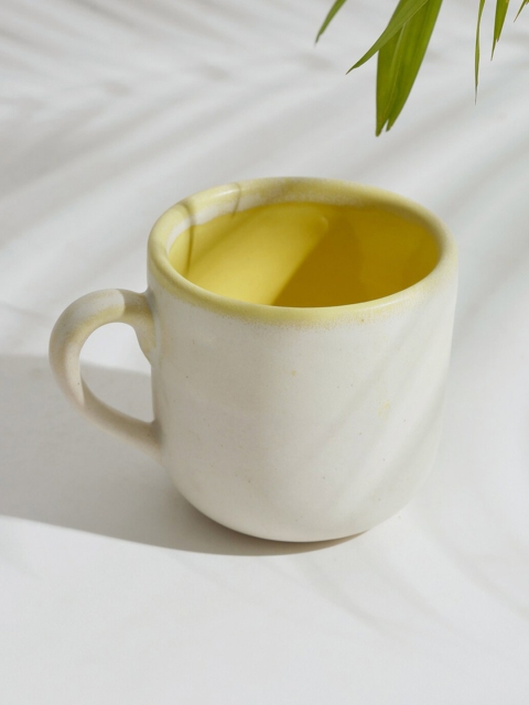 

Fabindia Yellow & Off White Off White Off White Solid Glazed Ceramic Matte Mug