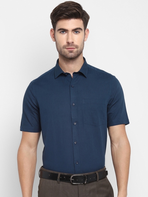 

Turtle Men Blue Solid Formal Shirt
