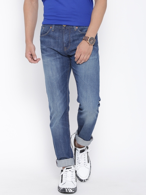 

Tommy Hilfiger Men Blue Slim Fit Mid-Rise Clean Look Jeans
