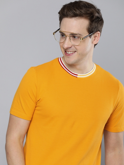 

Mast & Harbour Men Mustard Yellow Solid T-shirt