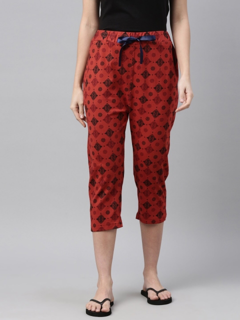 

Enviously Young Women Rust Orange Printed Cotton Capris