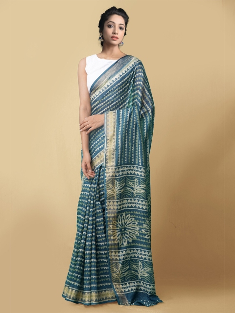 

Unnati Silks Blue & White Batik Printed Art Linen Saree