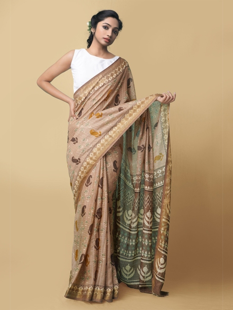 

Unnati Silks Brown & Mustard Batik Printed Art Linen Saree