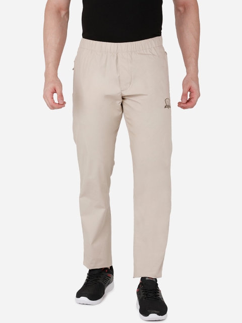 

beevee Men Beige Solid Mid Rise Regular Fit Easy Wash Trousers