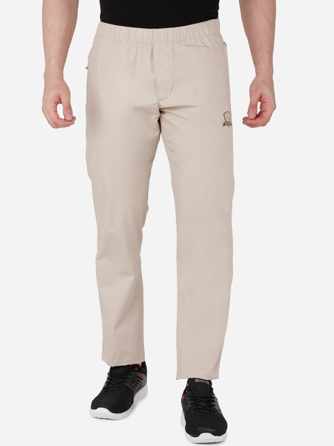 

beevee Men Beige Solid Mid Rise Regular Fit Easy Wash Trousers