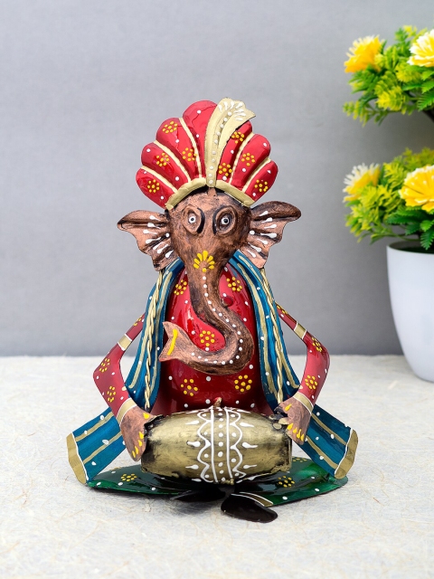 

Golden Peacock Red & Blue Handcrafted Ganesha Playing Dholak Showpiece