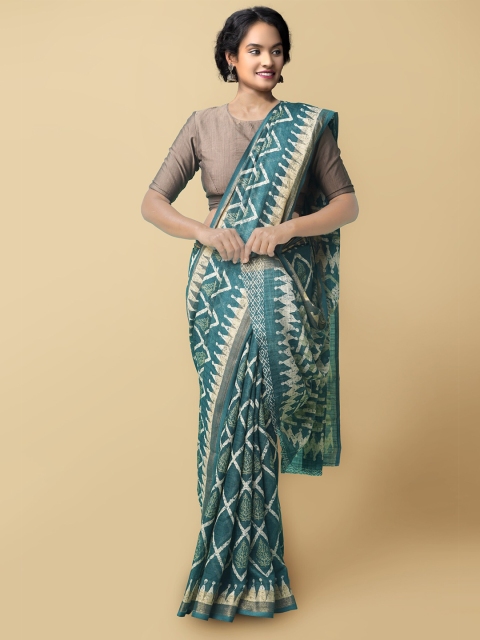 

Unnati Silks Teal Blue & Off White Linen Blend Jamdani Saree