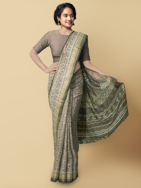 

Unnati Silks Green & Purple Ethnic Motifs Linen Blend Jamdani Saree