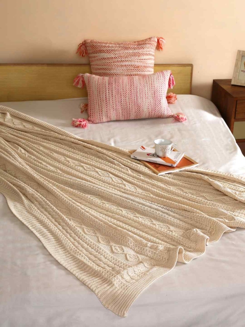 

Amoliconcepts Off-White Self Design Knitted Throw