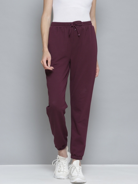 

Femella Women Wine Solid Track Pants, Maroon