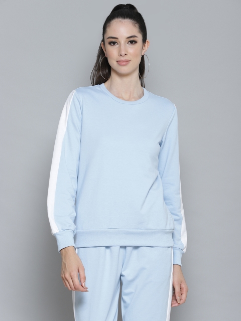 

Femella Women Blue Solid Sweatshirt