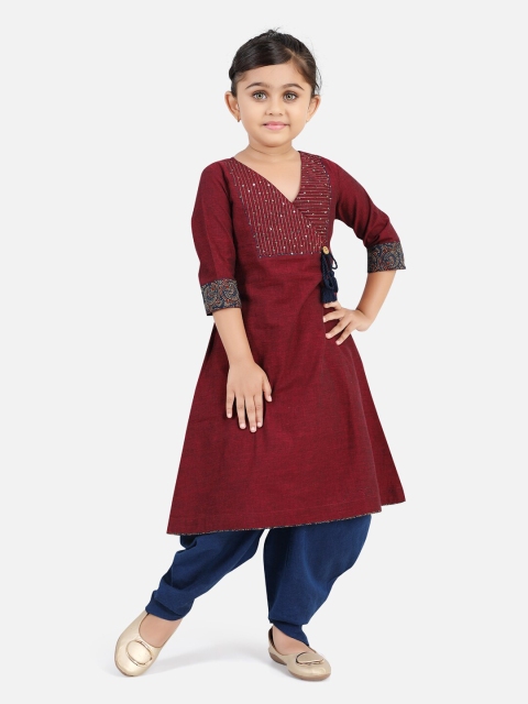 

Ashneeta Girls Maroon & Navy Blue Embellished Kurti & Dhoti Pants Set