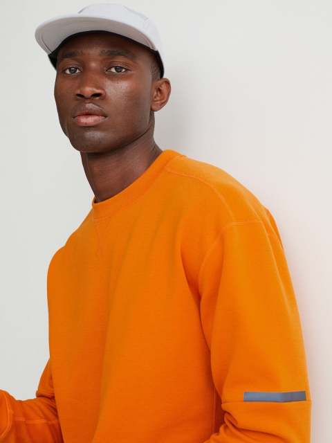 

H&M Men Orange Solid Relaxed Fit Sports Top