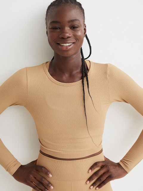 

H&M Women Beige Solid Cropped Seamless Sports Top
