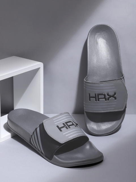 

HRX by Hrithik Roshan Men Grey & Black Brand Logo Print Comfort Sliders