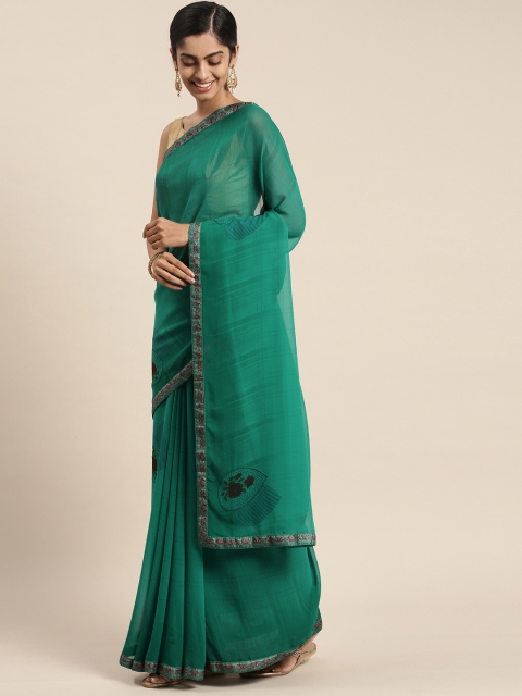 

Triveni Teal Floral Pure Georgette Saree