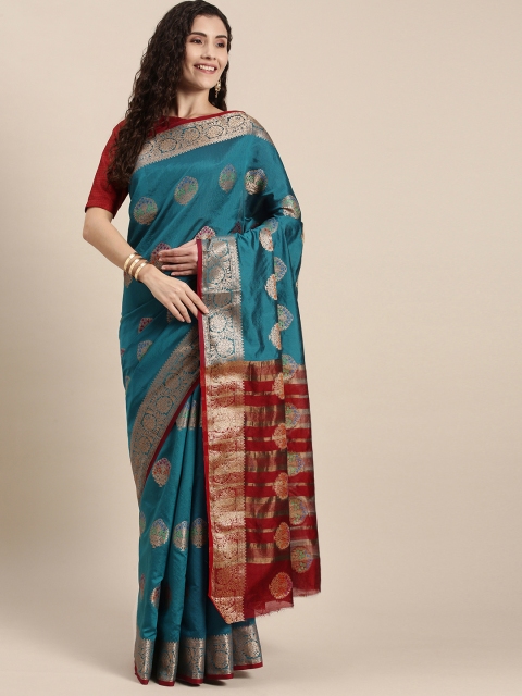

Triveni Turquoise Blue Ethnic Motifs Zari Silk Blend Paithani Saree