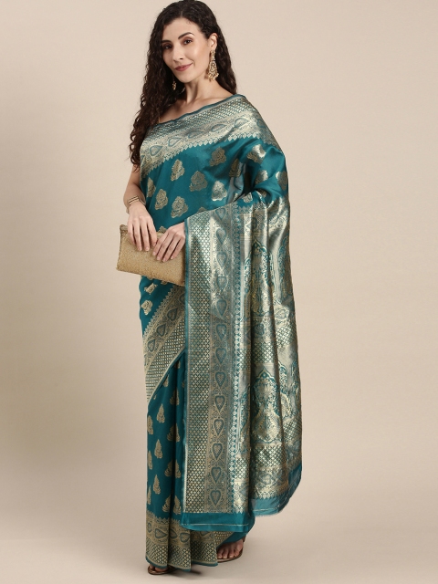 

Triveni Turquoise Blue Ethnic Motifs Zari Silk Blend Saree
