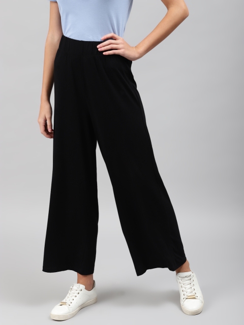 

Marks & Spencer Women Black Solid Loose Fit Trousers