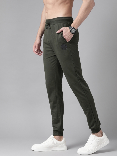 

The Roadster Lifestyle Co Men Olive Green Solid Joggers