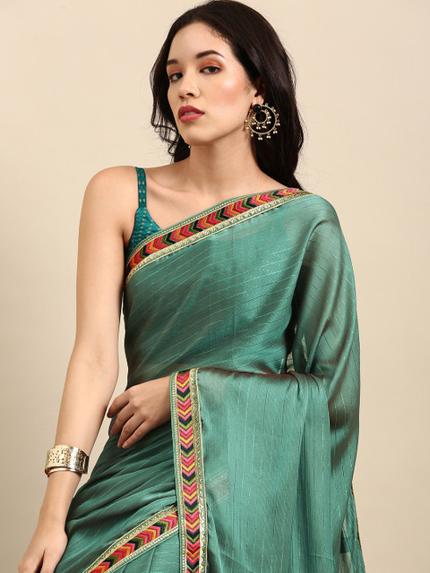 

Sangria Green Striped Embroidered Saree