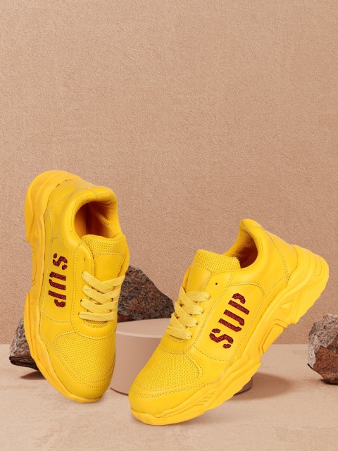 

Alishtezia Women Yellow Printed Mid-Top PU Sneakers