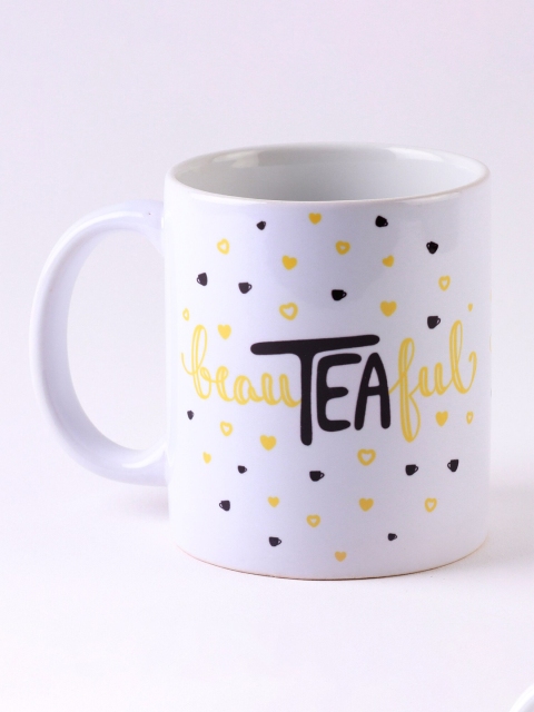 

Ferns N Petals White & Yellow Printed Ceramic Glossy Mugs