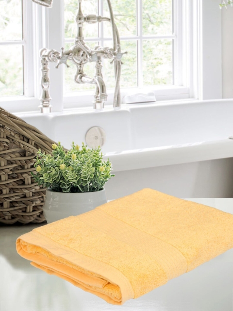 

Home Fresh Yellow Solid Cotton Bath Towel