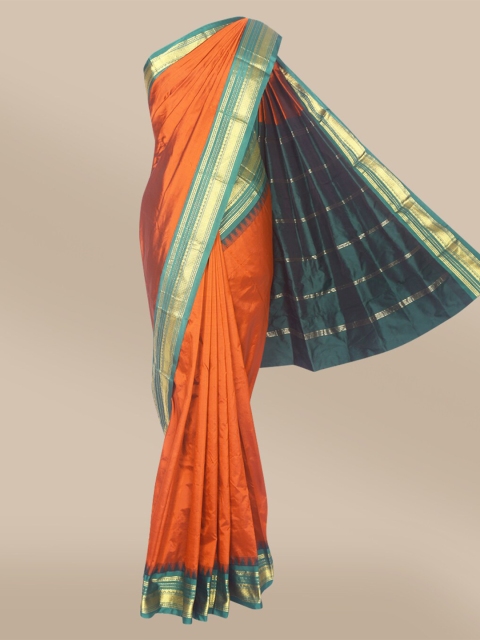 

The Chennai Silks Rust & Teal Pure Silk Zari Saree