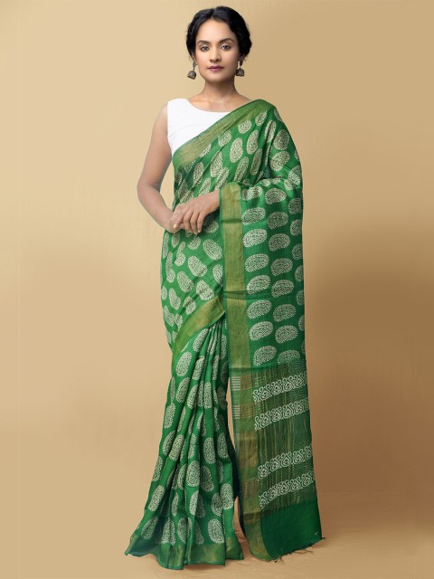 

Unnati Silks Green & White Ethnic Motifs Zari Pure Silk Muga Saree