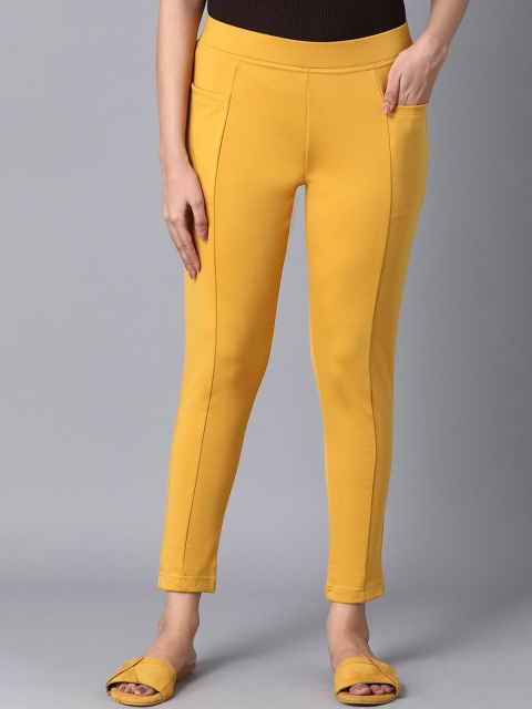 

elleven Women Yellow Solid Yoga Tights
