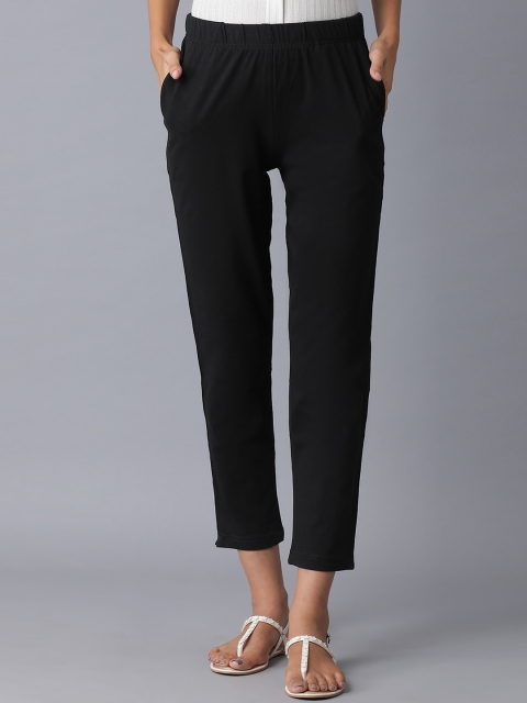 

elleven Women Black Solid Slim Fit Regular Trousers