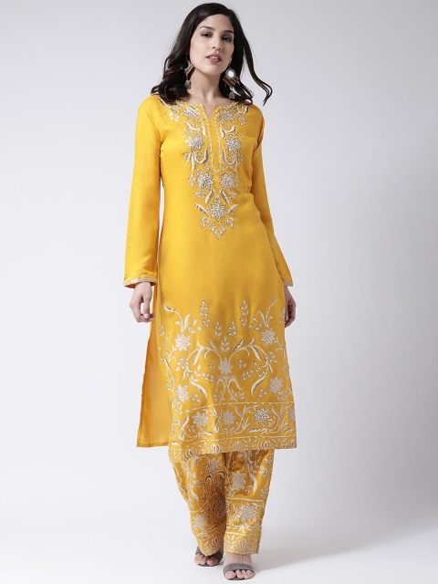 

Charitra Women Mustard Yellow Printed Panelled Kurti with Trousers
