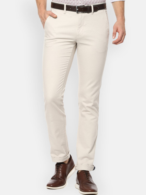 

Van Heusen Sport Men Beige Slim Fit Mid Rise Flat Front Trousers