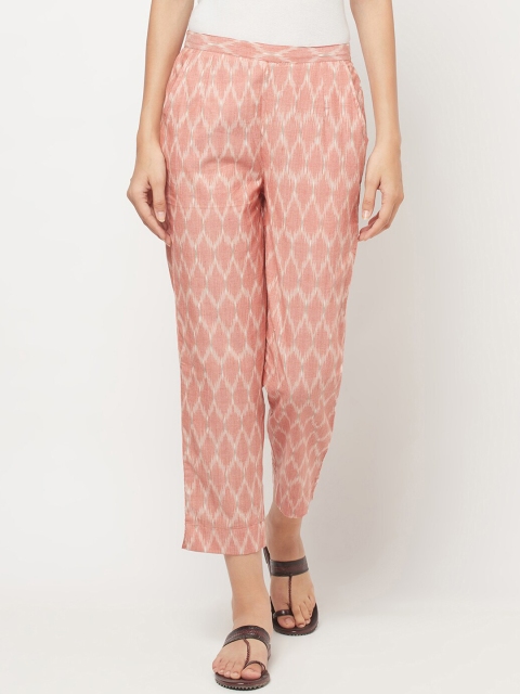 

Fabindia Women Peach-Coloured Ikat Printed Mid rise Tapered Fit Trousers